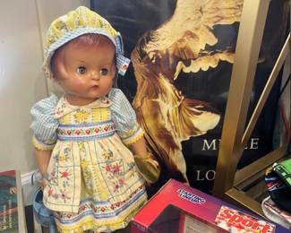 Vintage Doll and poster.