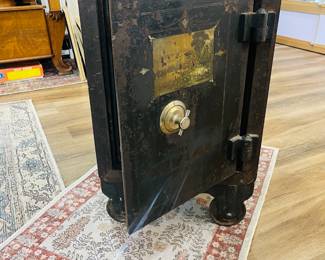 Antique cast iron safe. Works perfectly. I love this. Makes a creative side table and conversation piece, meanwhile keeping your valuables safe.