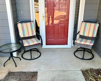 Outdoor swivel chairs and table