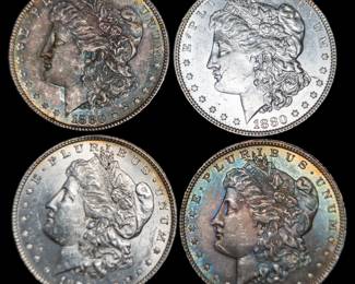 Lot 157: Four U.S. Morgan Silver Dollars