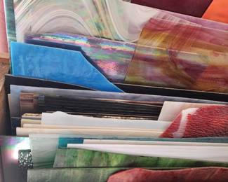 Assortment of stained glass pieces large and small
