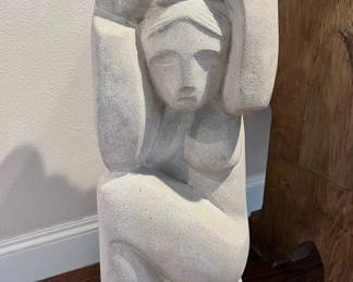 Sandstone sculpture of woman/child, artist Ken Patchy