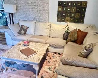 Very nice leather sofa group rug and coffee table