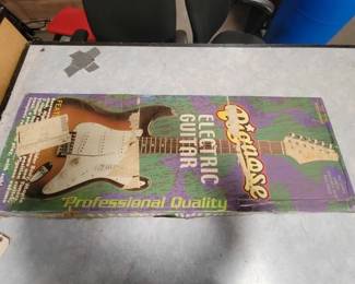 #1000 • Pignose Electric Guitar