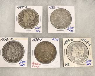 Morgan Silver Dollars 1884-S, 1886-O, 1886-O, 1889 (Toner), 1894-O