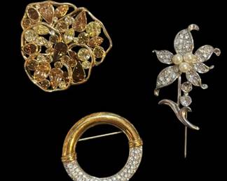 Three Brooches