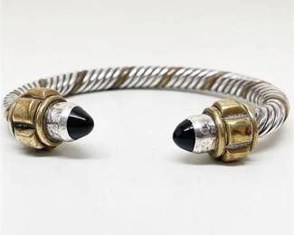 Lot 030 5 Bid(s)
Onyx and Sterling and Brass Torque Cable Bracelet, Signed