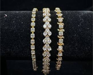 Lot 026-H 1 Bid(s)
Set of 3 Gold Tone and Rhinestone Bracelets