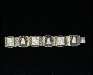 Lot 006 5 Bid(s)
Vintage Taxco Mexico Silver and Hand Carved Abalone Panel Link Bracelet
