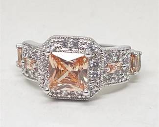 Lot 097 1 Bid(s)
Sterling Silver and Orange CZ Statement Fashion Ring