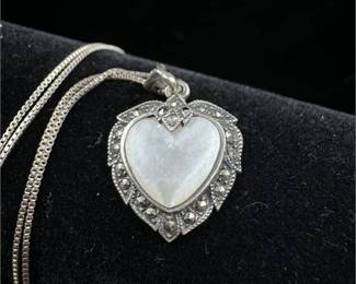 Lot 054 4 Bid(s)
Sterling Silver Vintage Mother of Pearl and Marcasite Necklace