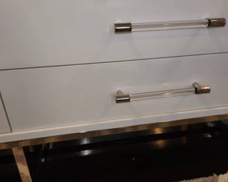 entertainment center drawer pull and feet detail