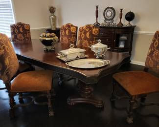 formal Dining set.  Table is 108" long (with two 18 " leaves inserted) x 43" wide. $1,800 for table, chairs, china cabinet & server
