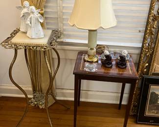 Several marble top tables and occasional tables