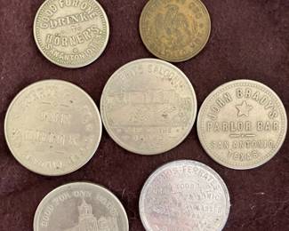 Antique saloon tokens from San Antonio and nearby