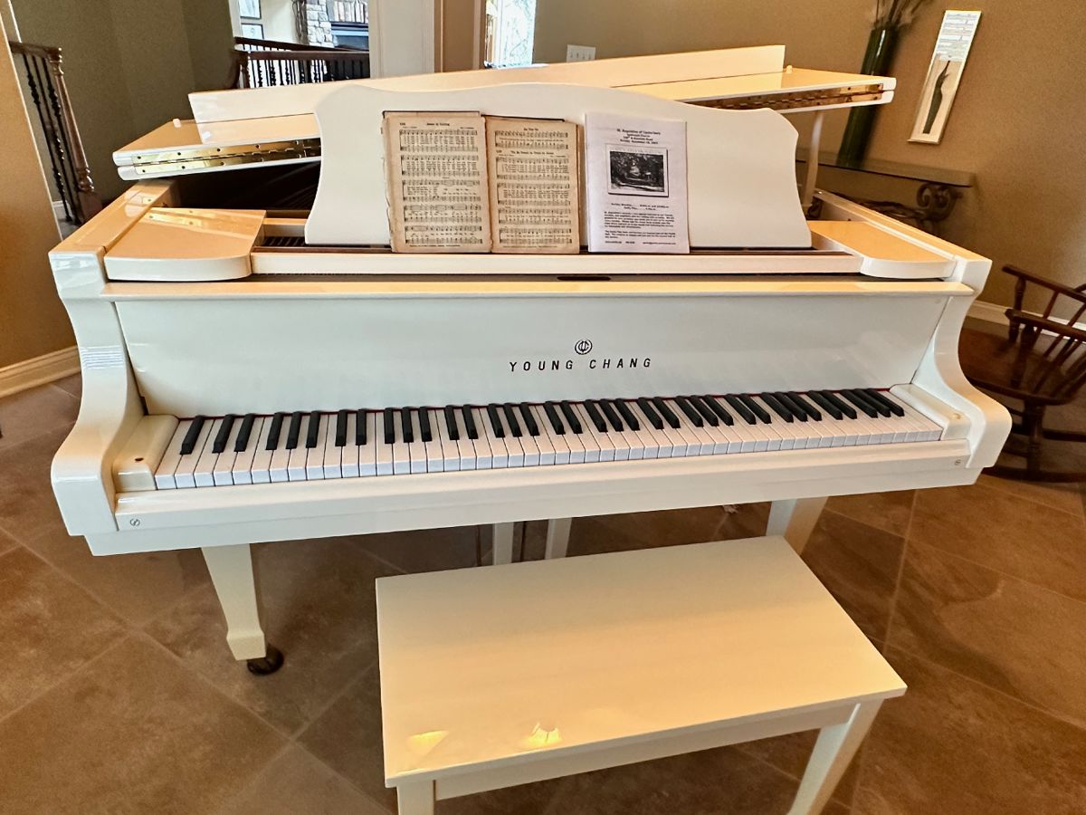 Young Chang white Grand Piano.