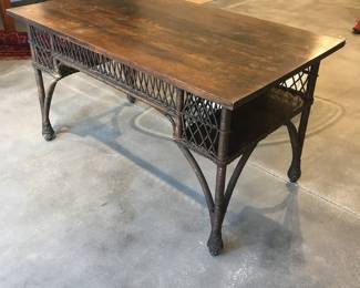Antique wicker library table