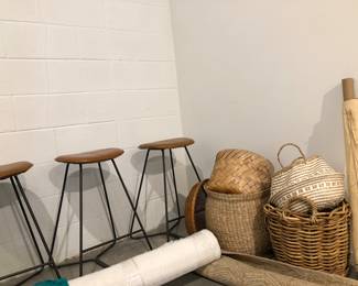 Handmade baskets, West Elm bar stools, tan wool throw rug, off white area rug, roll of antique Japanese silk fabric