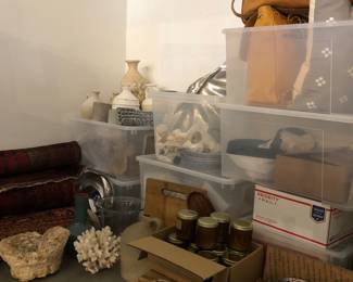 Goodies to be unboxed, pottery vases, leather bags, kitchen and serving ware  