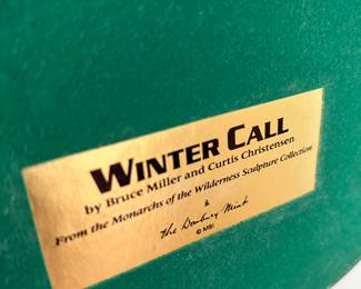 Label under the elk figurine