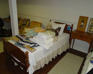 Blankets, and comforters, and quilts, nice and clean.  Two twin beds for sale as well