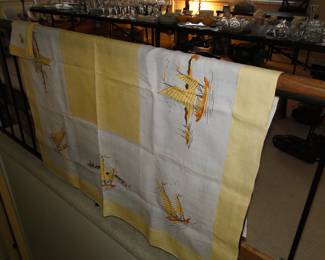 Bright vibrant colors on this wonderful handstitched tablecloth and napkin set