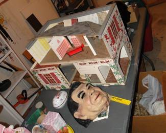 Doll House complete with all the furniture.  Looks like it went thru an earthquake, but it does assemble really nicely