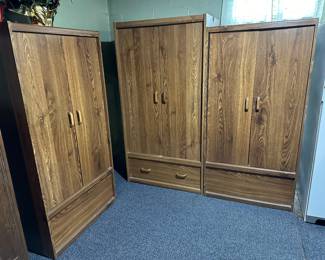 Here is a trio of very nice wardrobes. All empty and ready to move to your basement, garage or storage unit! 
