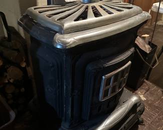 An awesome Vintage J.C. Penny Wood Burning Parlor Stove - Retail: 871-7780 - Catalogue: 901-6858! This piece is in VERY nice condition! It comes with the original installation manual. Please note: Due to our insurance coverage,  if you intend on/or purchasing this wood burning stove, you MUST bring tools to disassemble yourself, and a crew to move it. 