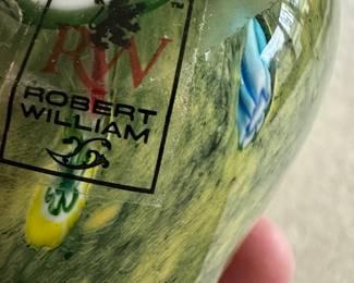 Beautiful heavy art glass paperweight. Tagged on bottom:  Robert William.