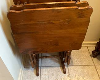 Preliminary walkthrough photo: 

Set of 4 wooden (oak) tv tables with holder. 