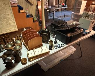 A table full of whatnots and some small electronics! 