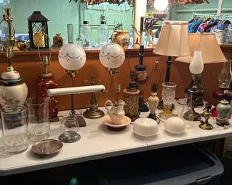The basement storage room was filled with lamps! We pulled them out, polished them up and displayed them. Electric and Oil lamps - big, tall, short and small! 