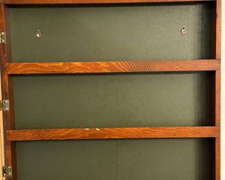 Preliminary walkthrough photo: 

A unique old wall mounted spice cabinet! 