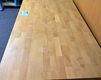 This is a terrific blond oak Farmstead Table! This table was a display piece from a furniture store. The tag tells the full story! Is in excellent condition. 