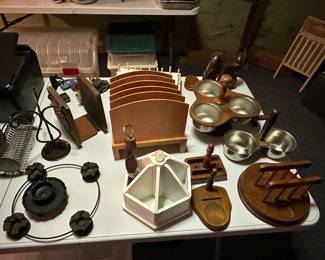 A table full of whatnots and some small electronics! 