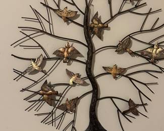 Preliminary walkthrough photo: 

Copper/Brass Tree with birds wall display!