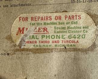 Vintage REVERSEW Electric Sewing Machine with Original Manual. Comes compete with wooden sewing table and some accessories.  