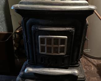An awesome Vintage J.C. Penny Wood Burning Parlor Stove - Retail: 871-7780 - Catalogue: 901-6858! This piece is in VERY nice condition! It comes with the original installation manual. Please note: Due to our insurance coverage,  if you intend on/or purchasing this wood burning stove, you MUST bring tools to disassemble yourself, and a crew to move it. 