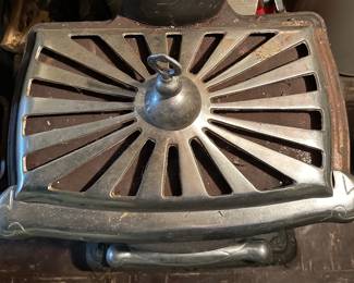 An awesome Vintage J.C. Penny Wood Burning Parlor Stove - Retail: 871-7780 - Catalogue: 901-6858! This piece is in VERY nice condition! It comes with the original installation manual. Please note: Due to our insurance coverage,  if you intend on/or purchasing this wood burning stove, you MUST bring tools to disassemble yourself, and a crew to move it. 