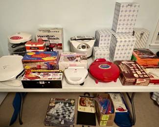 Hamilton Beach Coffee Maker • Griddles for just about Everything • A Nuwave  Infrared Oven • Snow Buddies • Rocket Grill • Glass Chess & Backgammon Game