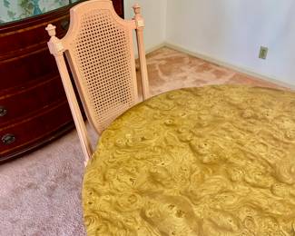 Drtail on oval burl table