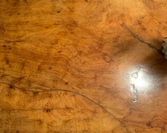 Detail of wood grain on bombe dresser