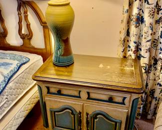 Pair of painted bedside tables and pair of pottery lamps