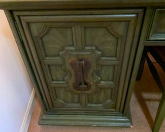 Detail of large Mid Century Modern, painted desk with glass top, green