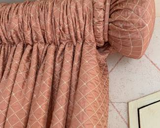 Two enormous sets of pink quilted drapes