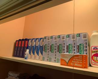 Boxes of gloves and Covid tests