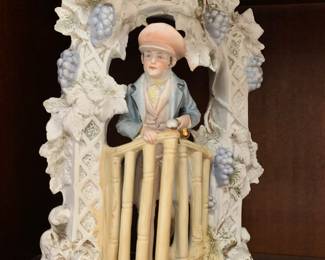 Old German bisque boy at the gate
