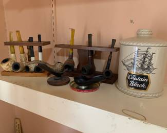 Vintage smoking pipes and acessories. Yes! There is Captain Black in that tobacco jar! 