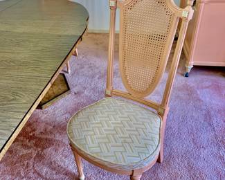 Peach colored dining room chairs -not peach colored server in background